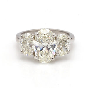 SOLD - 4.83ctw Oval Cut Diamond, 3 Stone Ring - IGI Certified